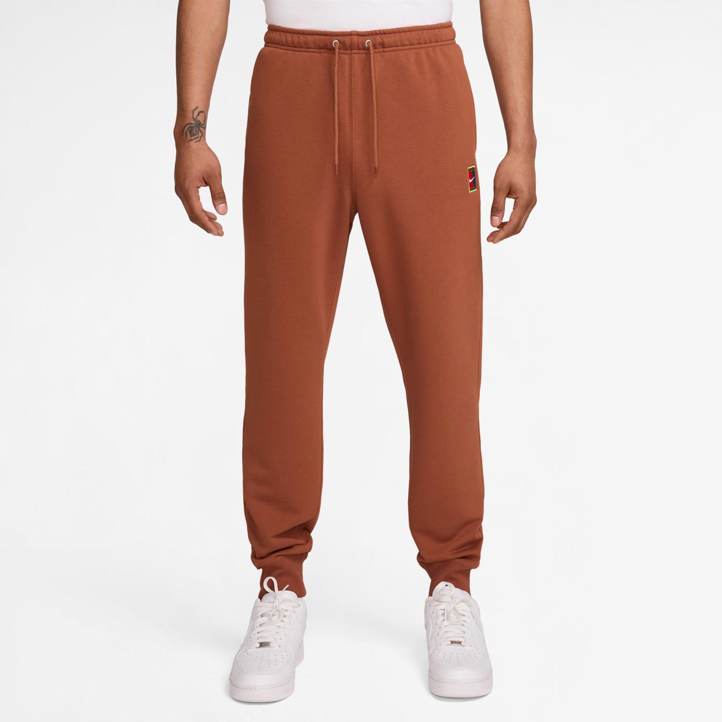 Nike Court Dri-Fit Heritage Fleece Pantalón De Entrenamiento Hombres-Óxido